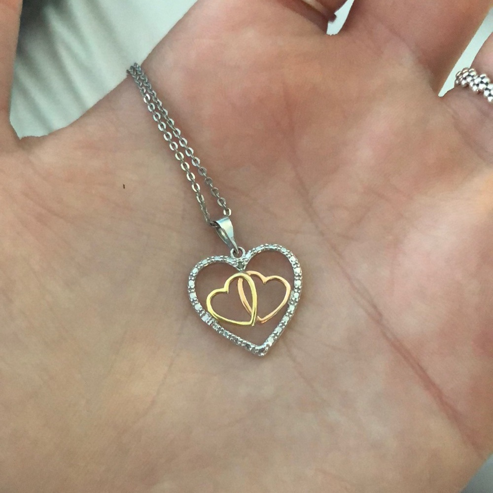 Gorgeous silver, gold, and bronze heart necklace